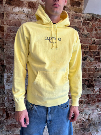 Supreme New York Yellow Logo Hoodie.