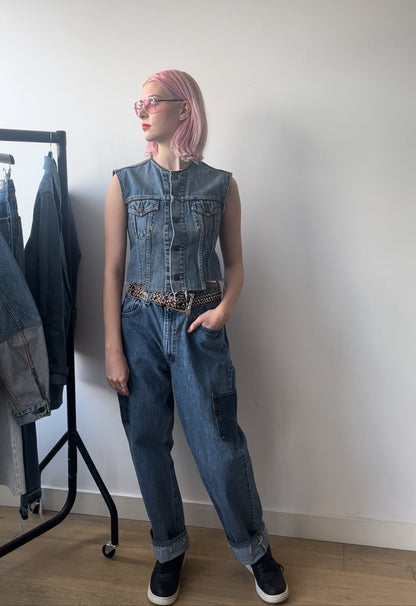 Berta mid wash denim waistcoat with stepped hem detail