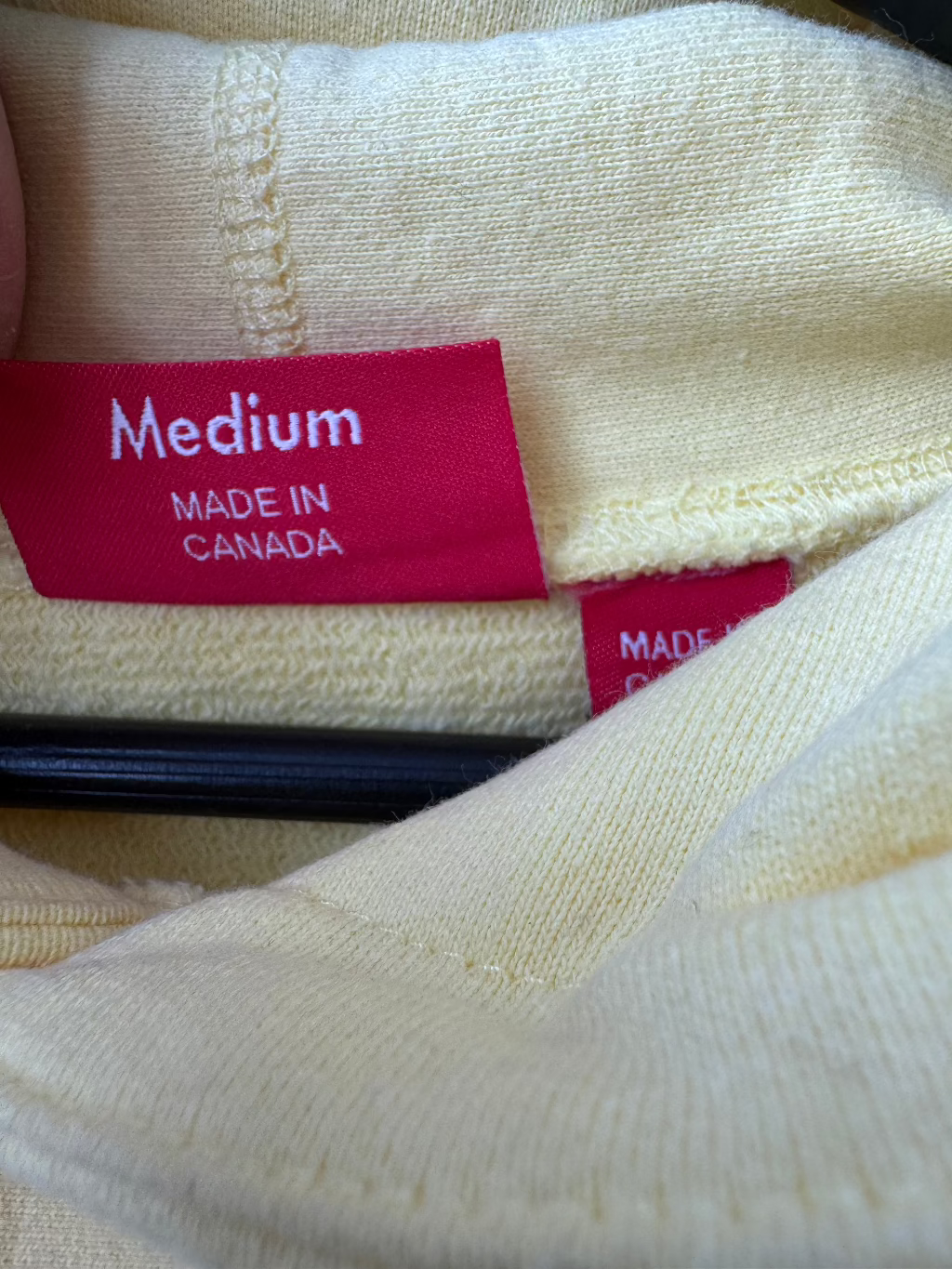 Supreme New York Yellow Logo Hoodie.