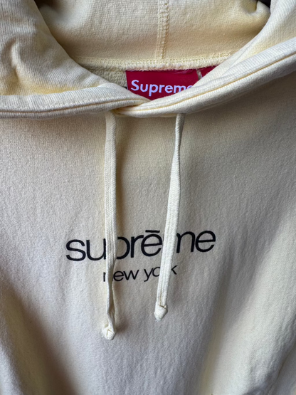 Supreme New York Yellow Logo Hoodie.